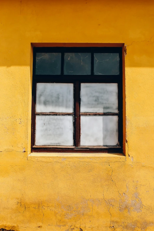 a fire hydrant in front of a yellow building, a picture, unsplash, minimalism, photo of a beautiful window, square, dressed in a worn, neo - andean architecture