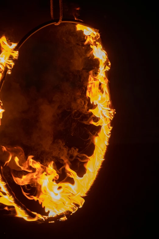 a fire ring is lit up in the dark, renaissance, profile image, hot sun from above, stunning vfx, up close