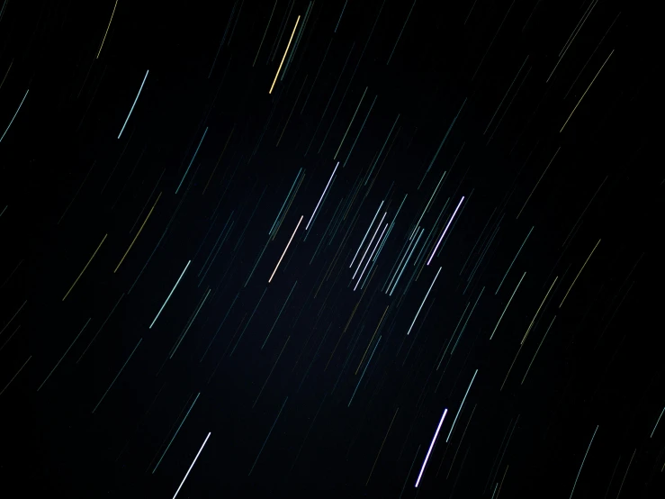 a long exposure of stars in the night sky, an album cover, unsplash, vertical lines, space debris, star rain, thin lines