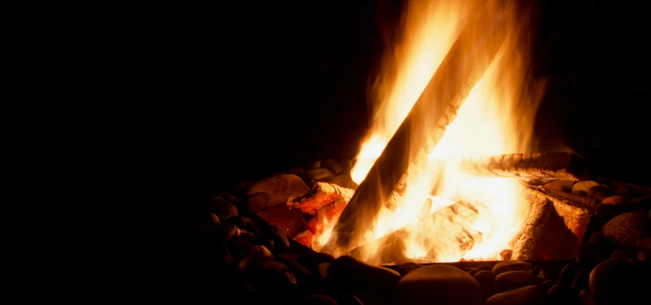 a close up of a fire in the dark, pexels contest winner, delightful surroundings, avatar image, warm summer nights, low - angle shot