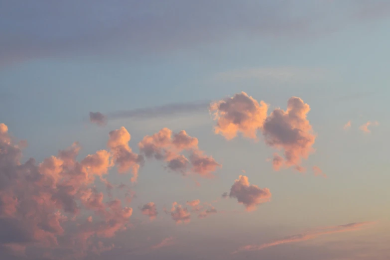 there is a plane that is flying in the sky, an album cover, inspired by Elsa Bleda, unsplash, aestheticism, light pink clouds, alessio albi, puffy cute clouds, late summer evening