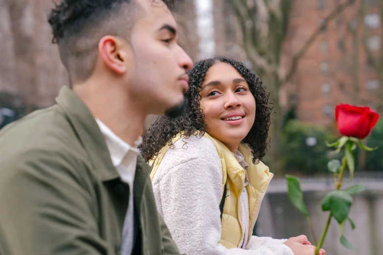 a man and a woman sitting next to each other, trending on pexels, young woman looking up, ashteroth, teenage boy, 1 5 0 4