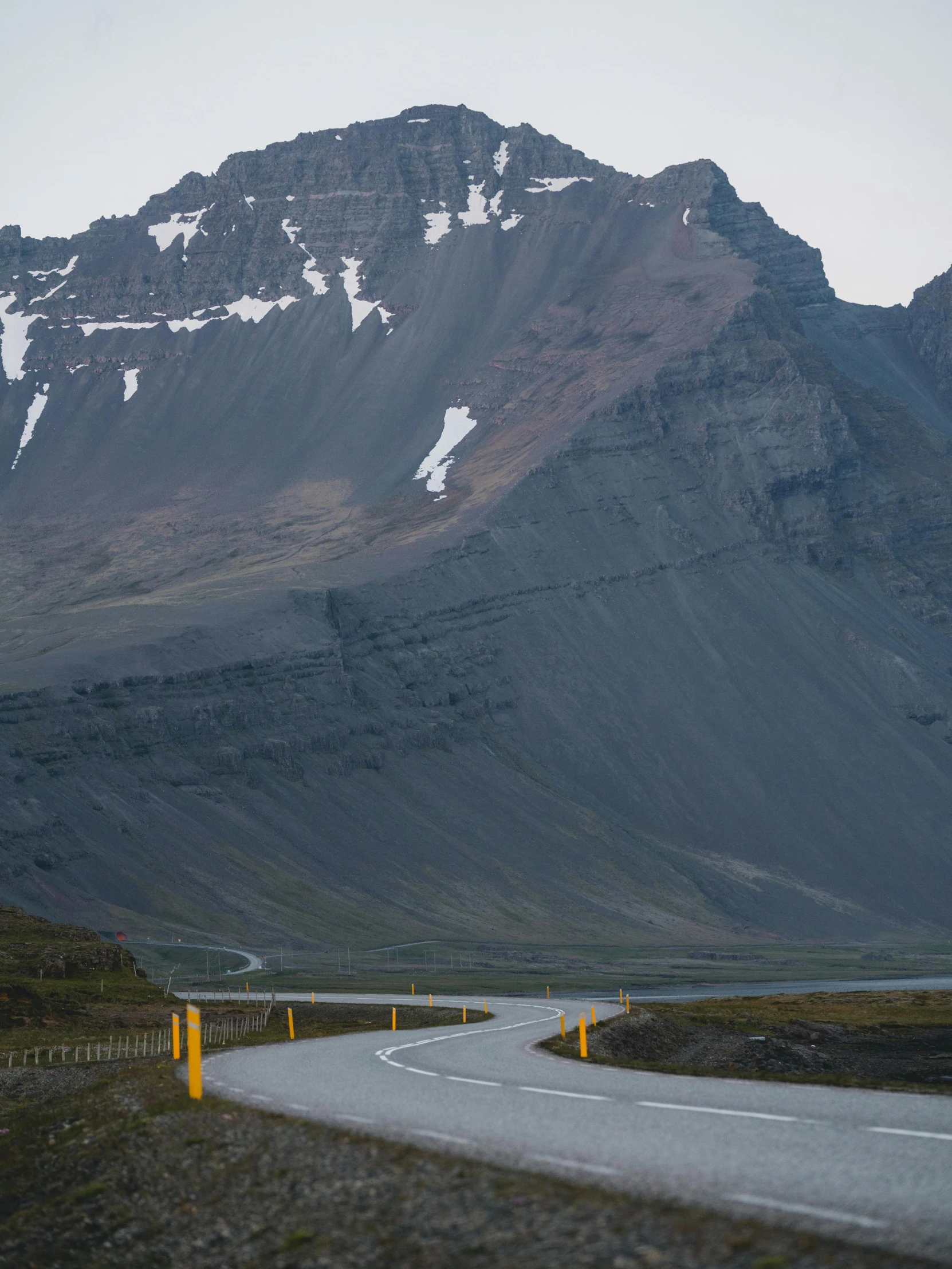 a road with a mountain in the background, by Hallsteinn Sigurðsson, pexels contest winner, hurufiyya, 4k detail post processing, glaciers, late summer evening, half turned around