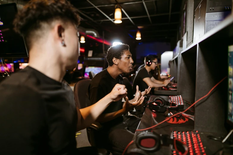 a group of young men playing a video game, pexels, hurufiyya, avatar image, team ibuypower, 2263539546], focused shot