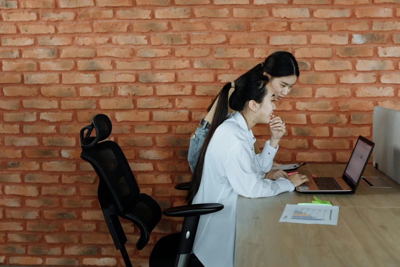 a couple of women sitting at a table with a laptop, profile image, background image, hoang long ly, office