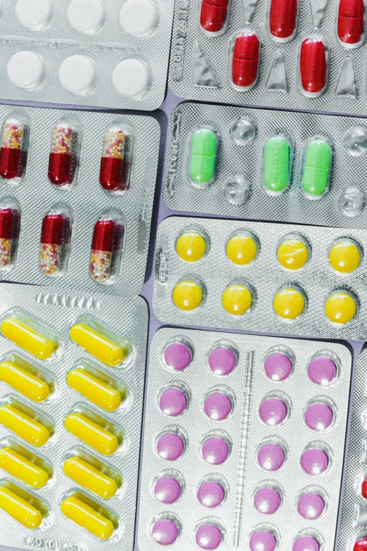 a bunch of pills in a blister pack, pexels, plasticien, overhead birdseye view, panels, 2010s, looking to the side