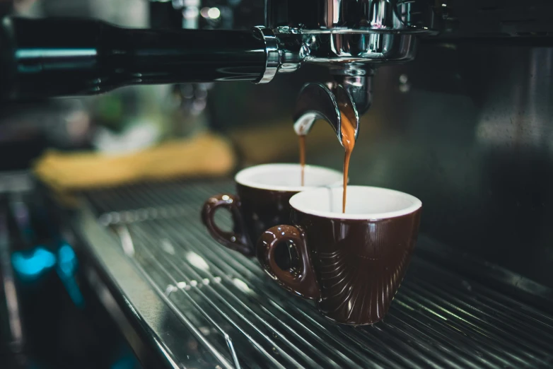 two cups of coffee being poured into a coffee machine, by Niko Henrichon, pexels contest winner, avatar image, a pair of ribbed, multiple stories, 1 2 9 7