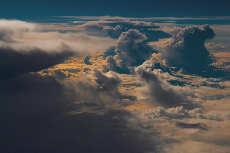 a group of clouds that are in the sky, by Niko Henrichon, pexels contest winner, birdseye view, major arcana sky, atmospheric 8k, unsplash 4k