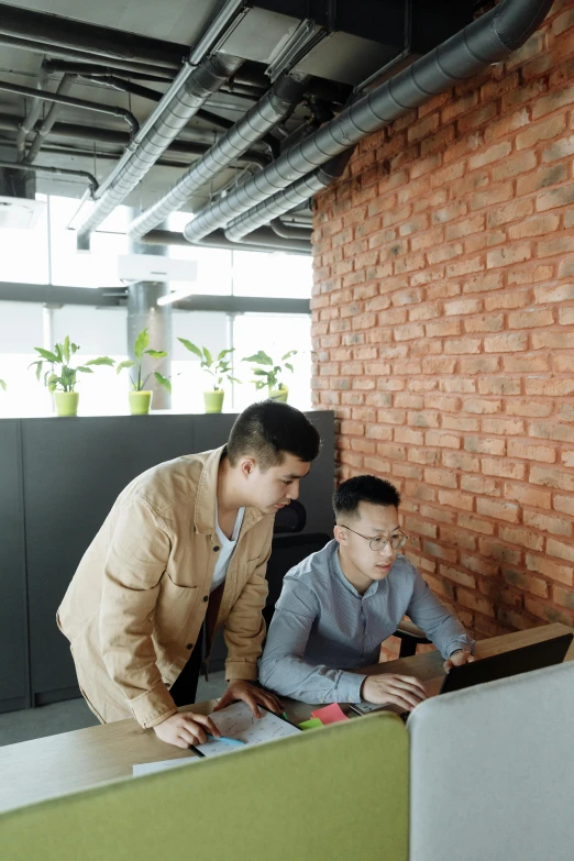 two men looking at a computer screen in an office, by Basuki Abdullah, pexels contest winner, renaissance, brick, gif, hoang long ly, standing