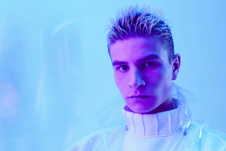 a close up of a person wearing a white shirt, an album cover, inspired by Kristian Kreković, trending on pexels, blue neon lighting, gel spiked hair, wearing turtleneck, male model
