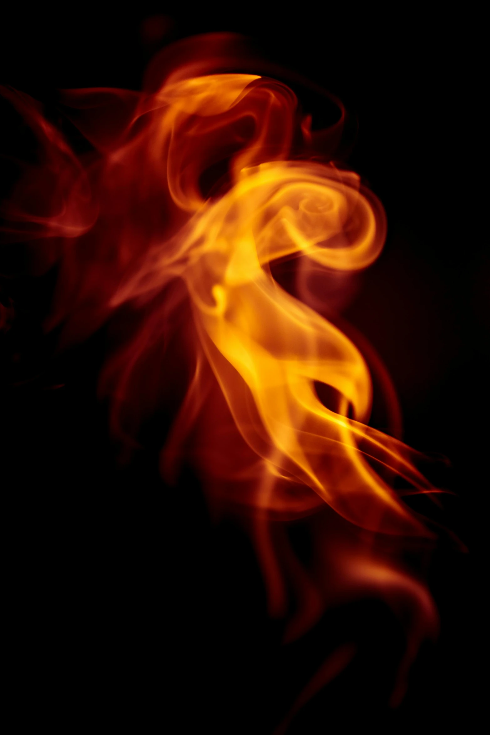 a close up of a fire on a black background, by Daniel Taylor, a dark phoenix, soft smoke, avatar image, swoosh