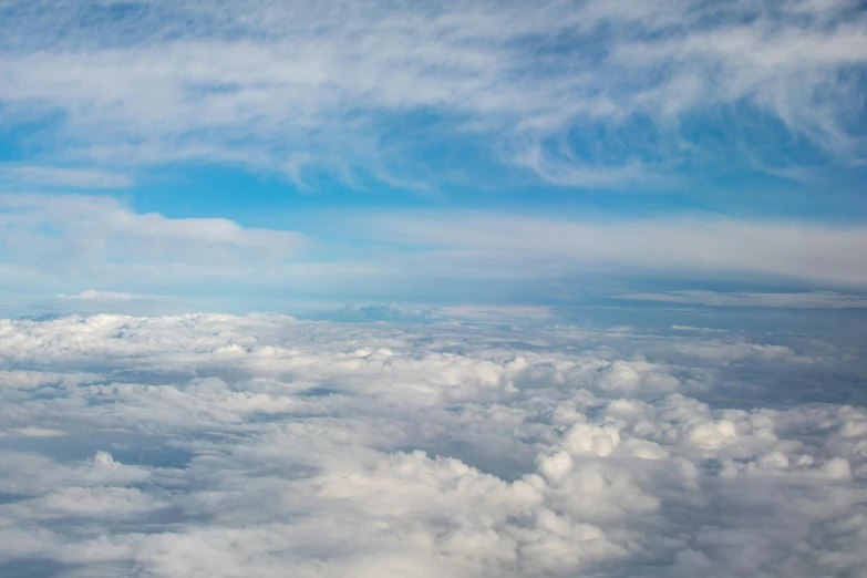 a view of the sky and clouds from an airplane, by Niko Henrichon, pexels contest winner, surrealism, light blue clear sky, today\'s featured photograph 4k, birds eye view, major arcana sky