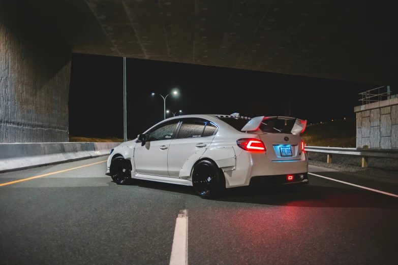 a white car driving down a highway at night, inspired by An Gyeon, unsplash, subaru, full body pose, thicc build, 🚿🗝📝