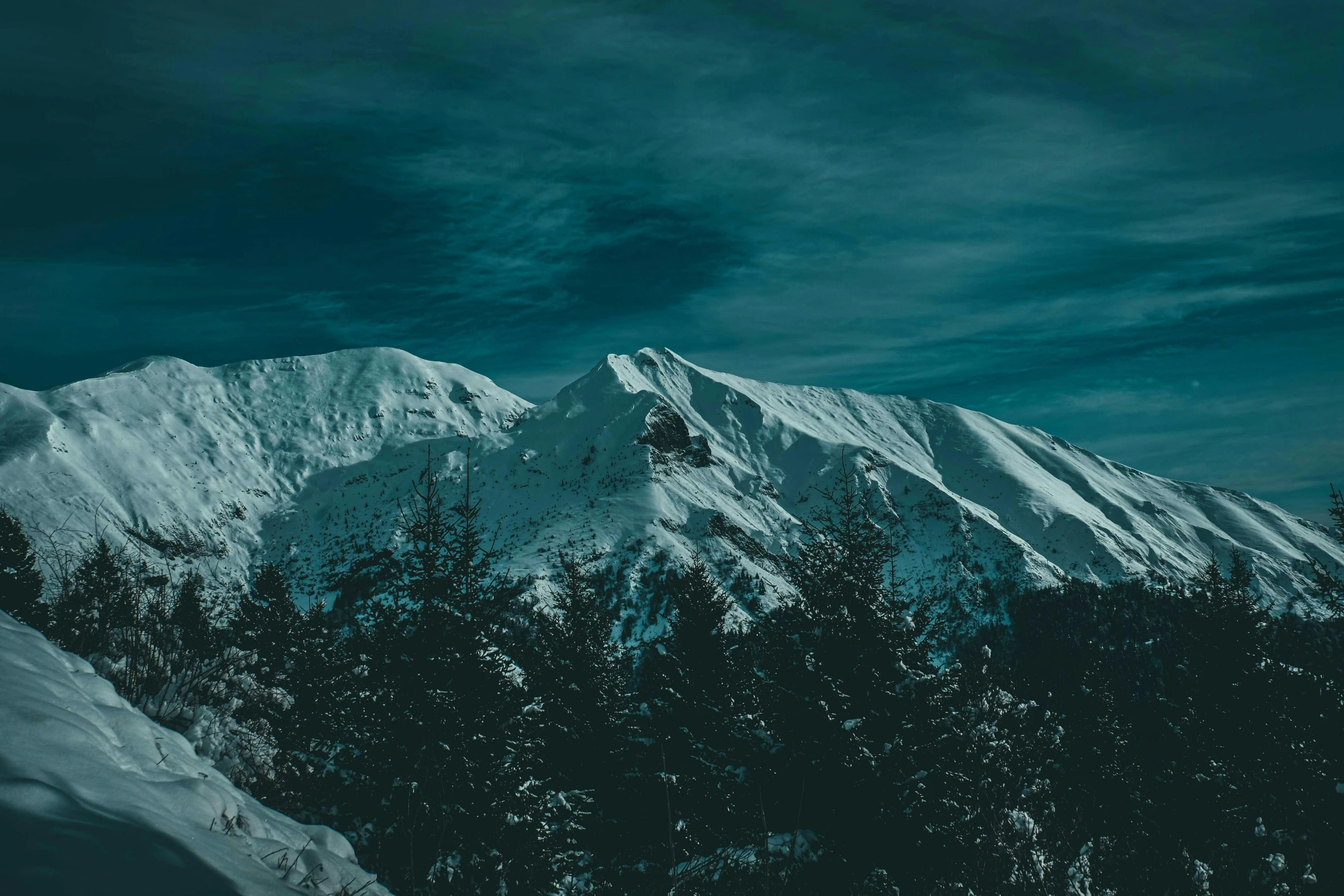 a man riding a snowboard down the side of a snow covered slope, a matte painting, unsplash contest winner, hurufiyya, solo hiking in mountains trees, on a dark background, from twin peaks, 4k hd wallpaper:4