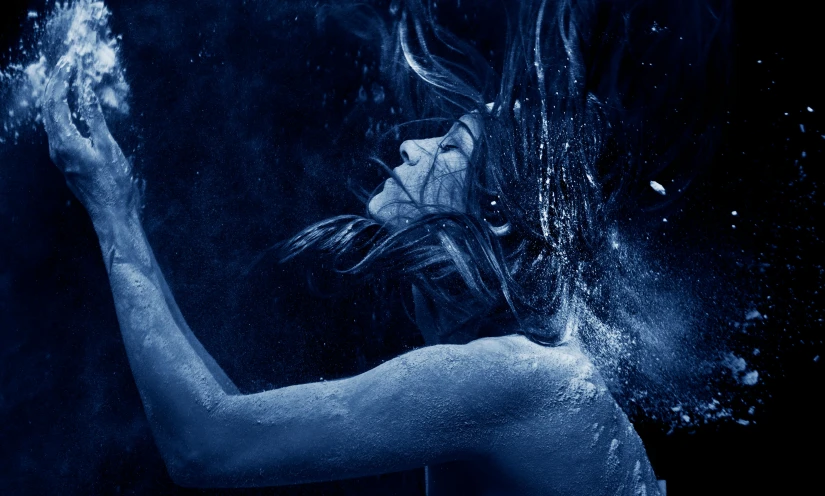 a woman that is standing in the water, an album cover, pexels contest winner, process art, blue particles, the expanse tv series, wet flowing hair, thirst