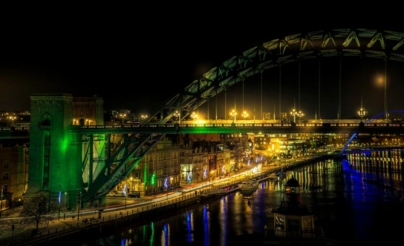 a bridge over a body of water at night, by Peter Churcher, pexels contest winner, renaissance, full of greenish liquid, marsden, port, retro style ”