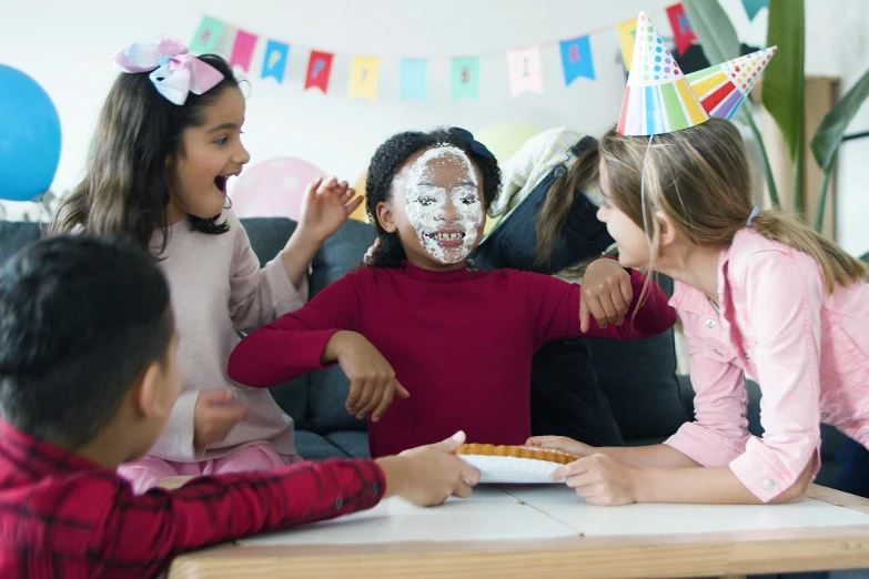 a group of children at a birthday party, pexels contest winner, white facepaint, cake, promo image, performing