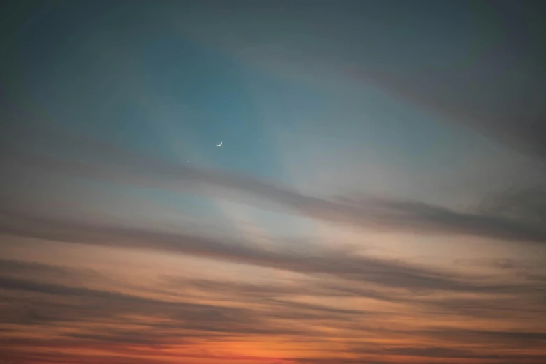 a plane flying over a body of water at sunset, a minimalist painting, unsplash contest winner, minimalism, crescent moon, altostratus clouds, moonbow, ☁🌪🌙👩🏾