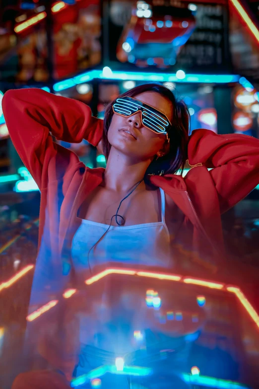 a woman standing in front of neon lights, trending on pexels, holography, implanted sunglasses, red lights, movie still of a cool cyborg, night club