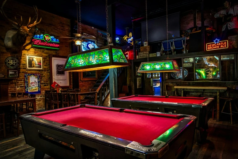 a couple of pool tables in a room, by Meredith Dillman, pexels contest winner, chinatown bar, exterior shot, thumbnail