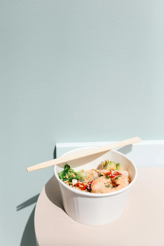 a close up of a bowl of food with chopsticks, by Nicolette Macnamara, minimalism, square, customers, a blond, bright sky