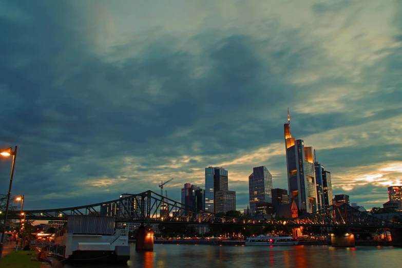 a large body of water with a city in the background, pexels contest winner, german romanticism, twilight skyline, a wooden, group photo, with towers