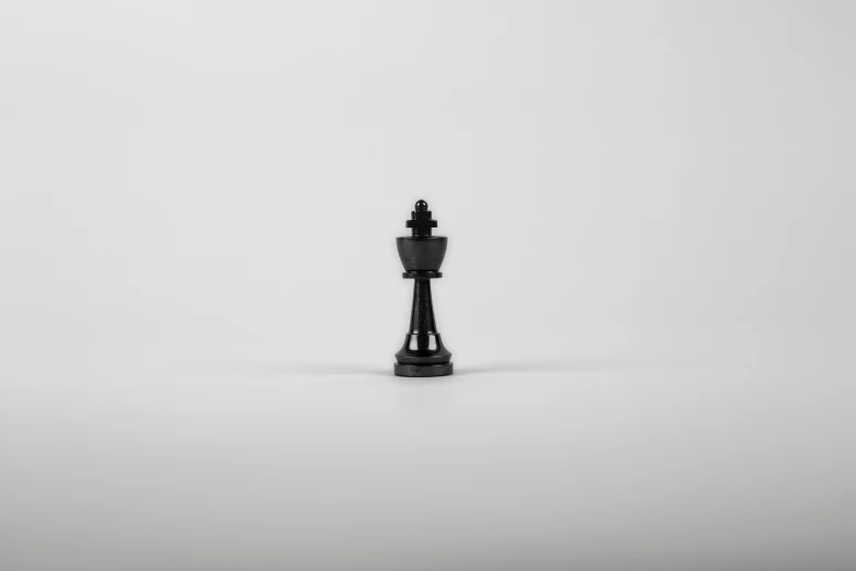 a black chess piece on a white background, by Emma Andijewska, unsplash, minimalism, queen chess piece, asset on grey background, miniature product photo, high picture quality