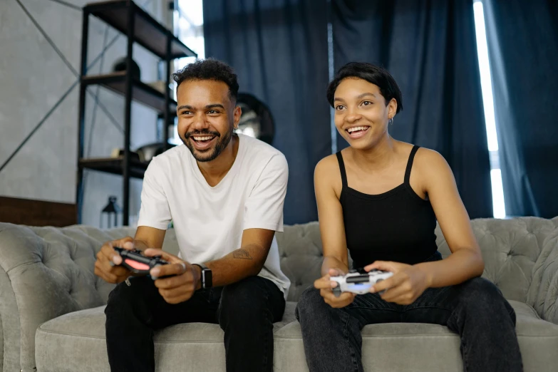 a man and a woman sitting on a couch playing video games, pexels contest winner, avatar image, mkbhd, sport game, instagram post