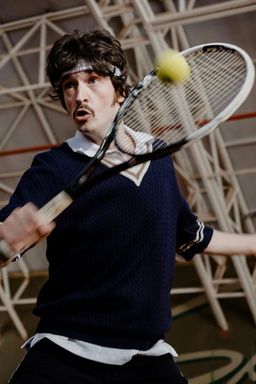 a man hitting a tennis ball with a racquet, an album cover, inspired by Hans Mertens, unsplash, photorealism, adam driver, frank zappa, intense expression, still from a wes anderson movie