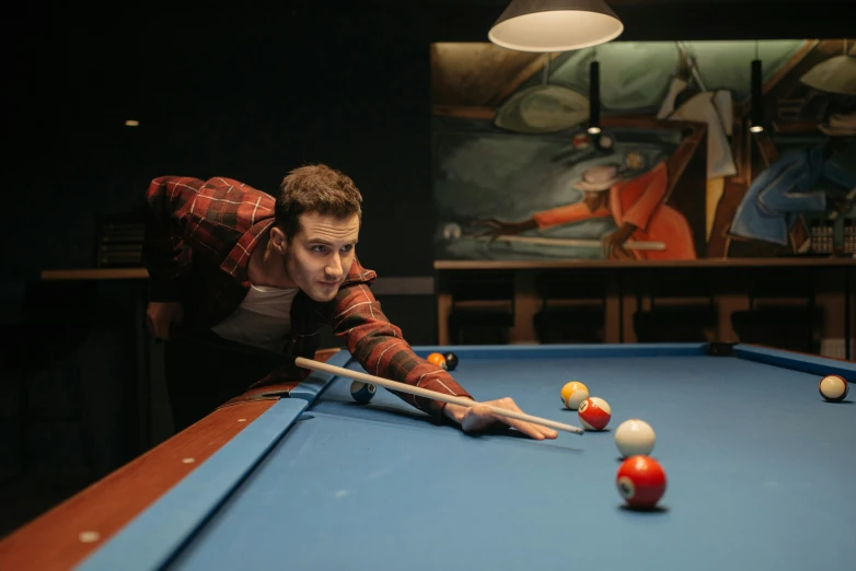 a man leaning over a pool table with a cue, pexels contest winner, eng kilian, f 1 driver charles leclerc, rectangle, ignant
