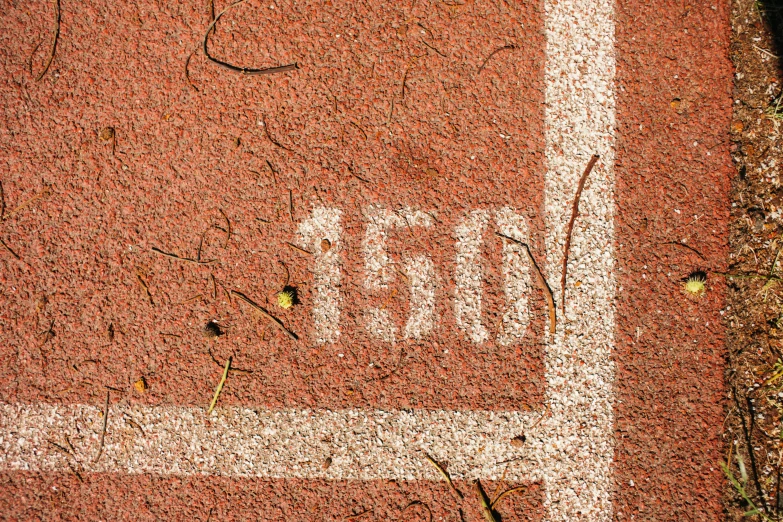 a tennis court with a white line painted on it, by Daniel Lieske, unsplash, graffiti, 1 8 5 0 s, countdown, heavy grain-s 150, on a racetrack