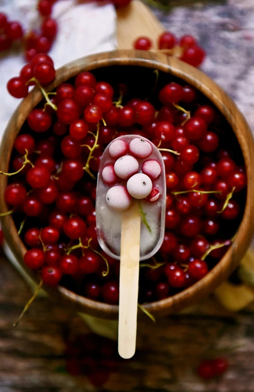 a wooden bowl filled with lots of red berries, pexels, ice cream, avatar image, bubblegum pop, red and white