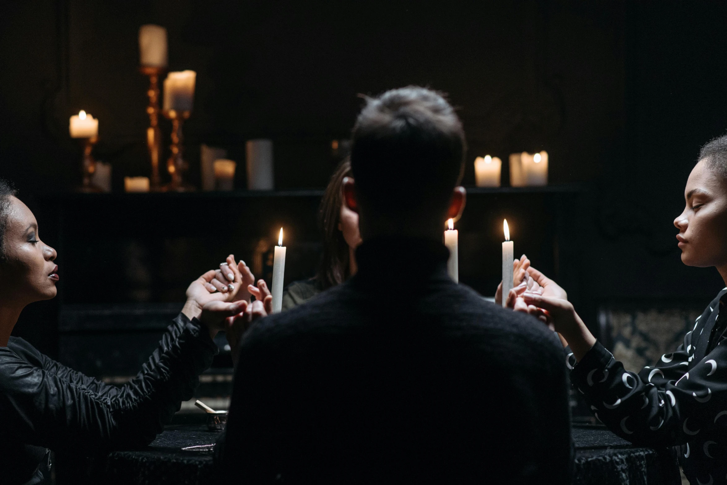 a group of people sitting around a table with candles, doing witchcraft, profile image, fan favorite, instagram photo