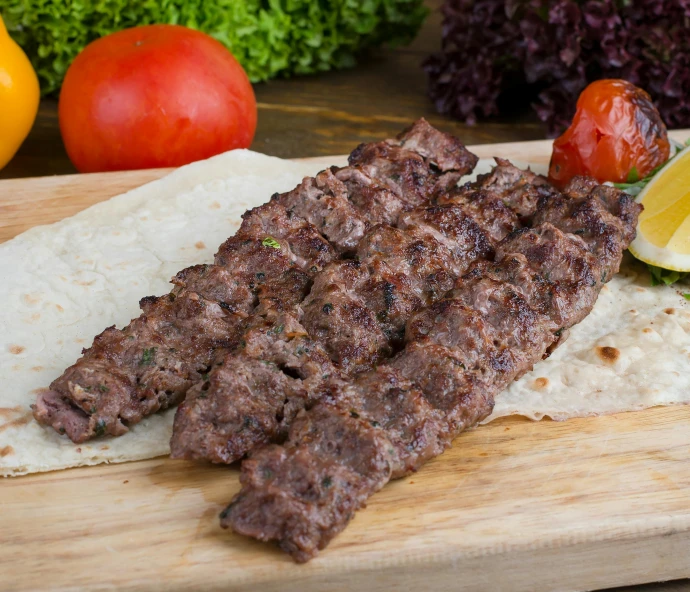 a piece of meat sitting on top of a wooden cutting board, hurufiyya, kebab, 6 pack, kyza saleem, grey