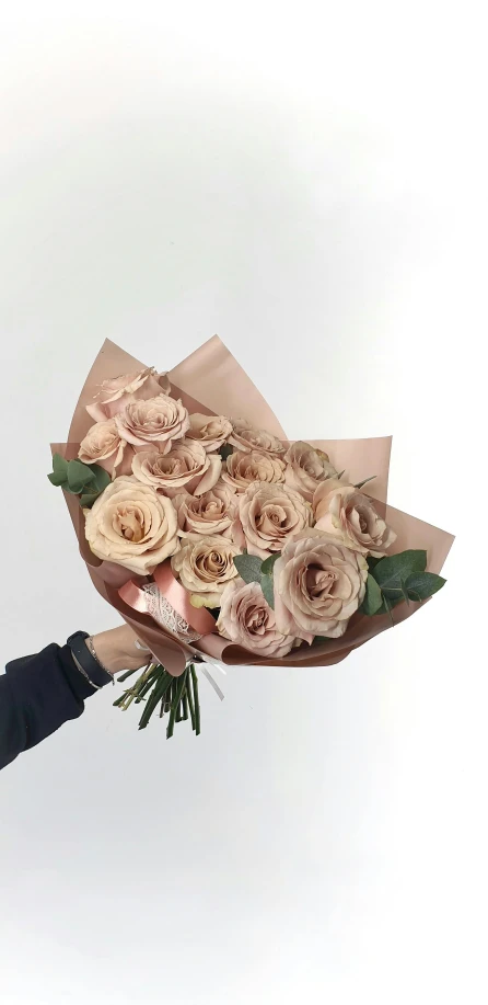 a woman holding a bouquet of pink roses, inspired by François Boquet, instagram, muted browns, sleek, 2995599206, angled shot