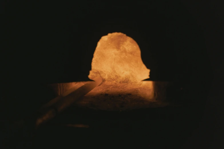 a large rock sitting on top of a table, by Otto Piene, process art, close up of single sugar crystal, torchlit, in an underground laboratory, 1980s photograph