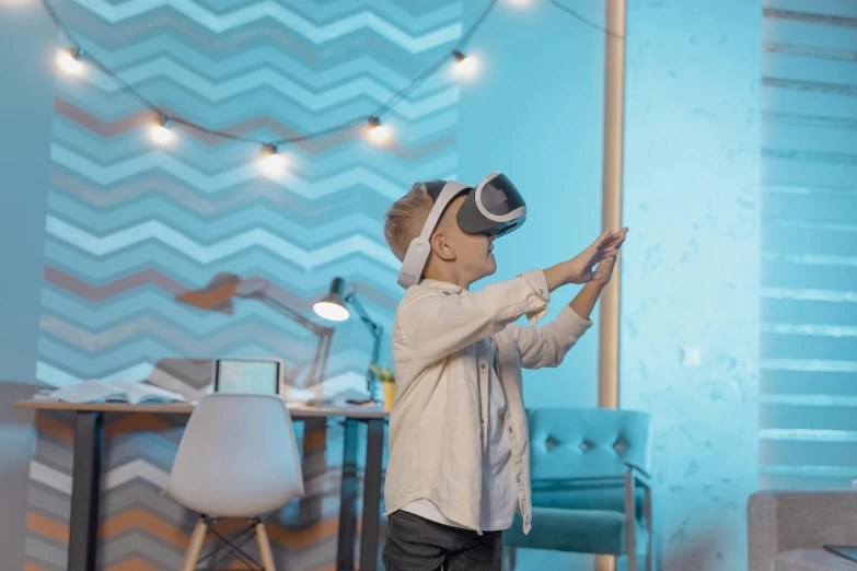 a little boy playing with a virtual reality headset, by Adam Marczyński, trending on pexels, interactive art, photograph of 3d ios room, blue light accents, decoration, lachlan bailey