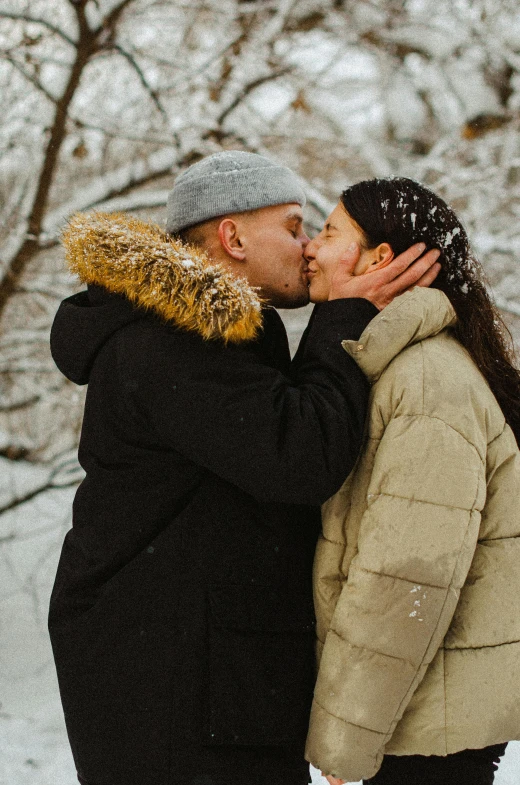 a man and woman kissing in the snow, profile image, promo image, taken in 2 0 2 0, f/8.0