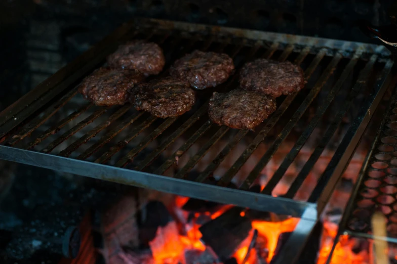 hamburgers cooking on a grill over an open fire, by Joe Bowler, pexels, fan favorite, hamburger mix jellyfish, stacked image, pbr