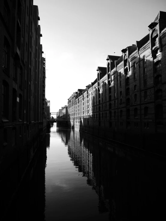 a black and white photo of a canal, by Andor Basch, berlin city, perfect crisp sunlight, empty buildings, ilustration