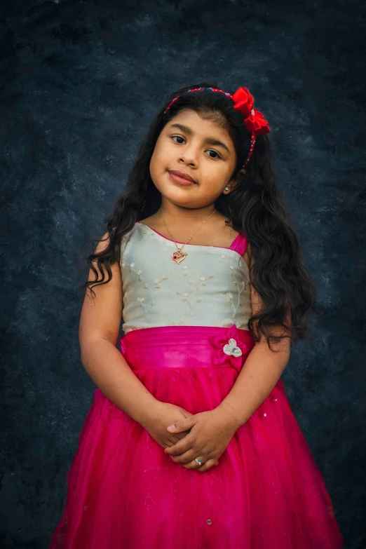 a little girl in a pink dress posing for a picture, an album cover, by Max Dauthendey, shutterstock contest winner, of indian princess, 15081959 21121991 01012000 4k, 🤤 girl portrait, grey