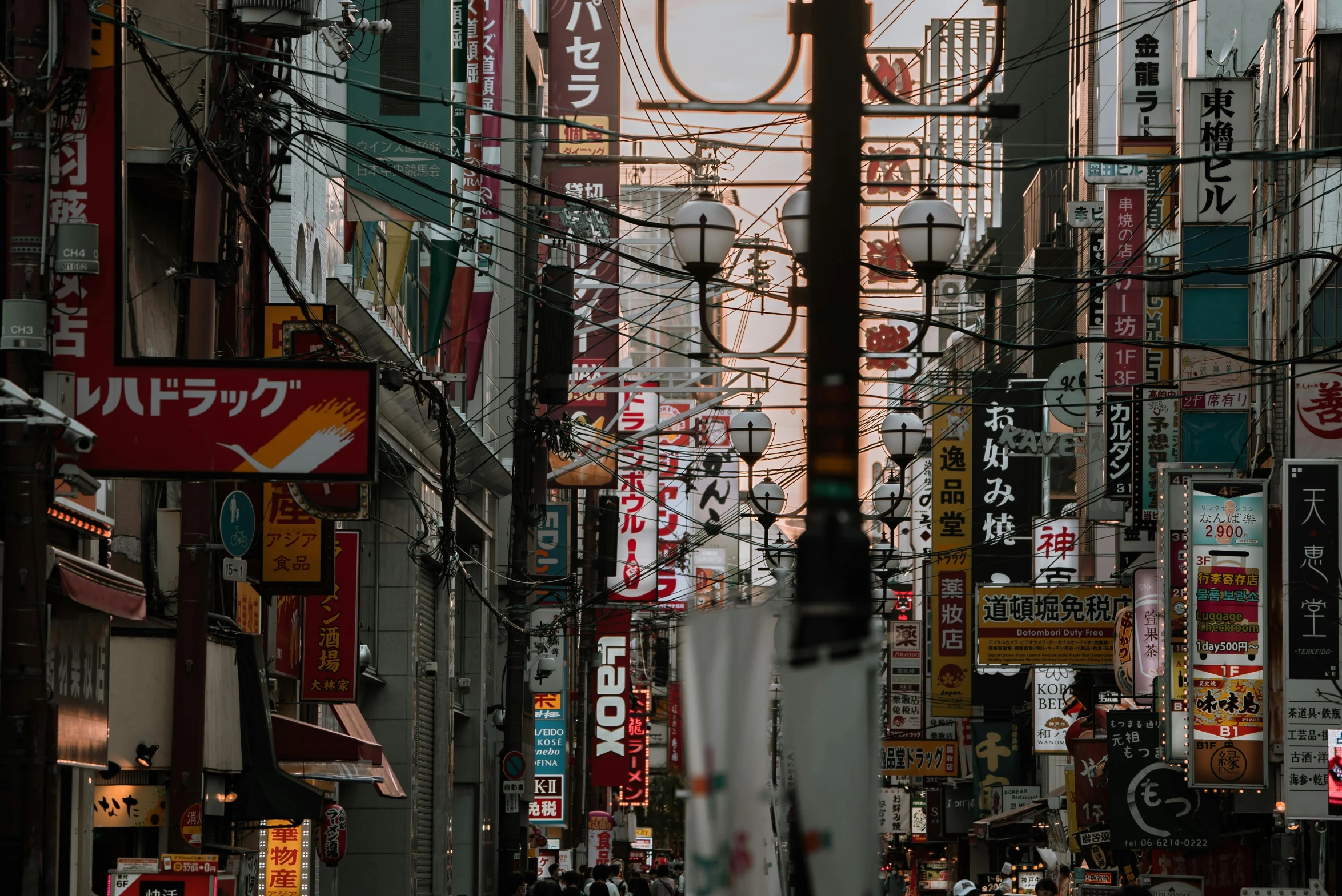 a city street filled with lots of tall buildings, a photo, pexels contest winner, ukiyo-e, colorful signs, brown, light academia aesthetic, ad image