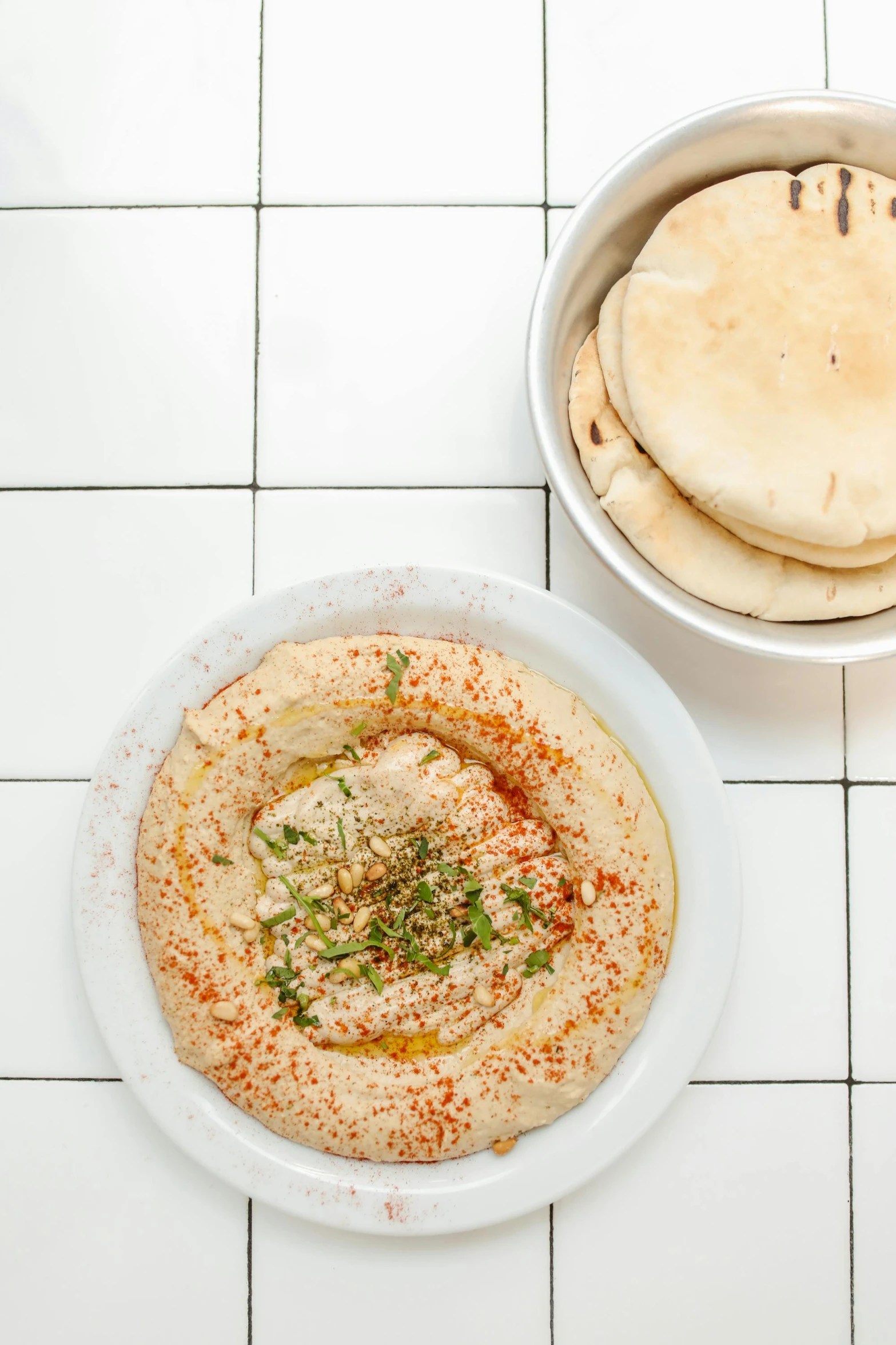 a bowl of hummus and a plate of pita bread, by Emanuel Witz, trending on unsplash, dau-al-set, fullbody view, kami, jerusalem, 4l