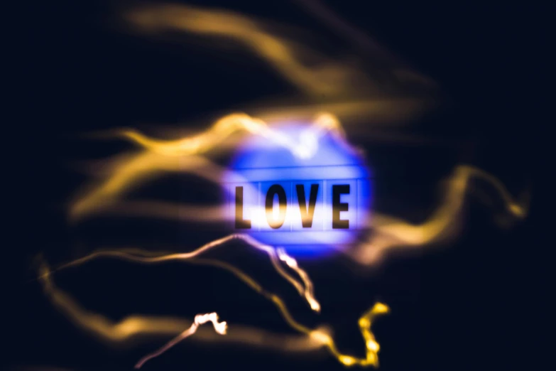 a blurry photo of the word love, by Julia Pishtar, abstract lighting, avatar image, electric, love is begin of all