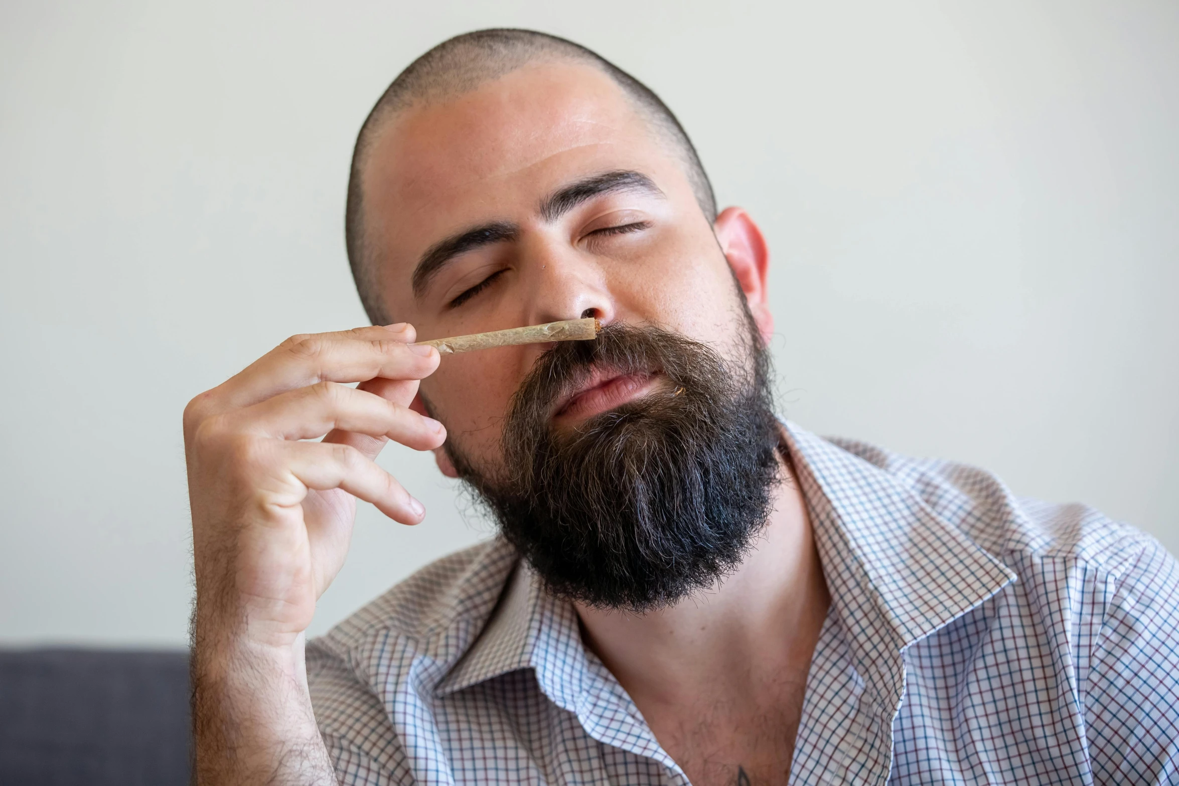 a man with a beard and a cigarette in his mouth, featured on reddit, holding a magic needle, australian, hemp, profile image