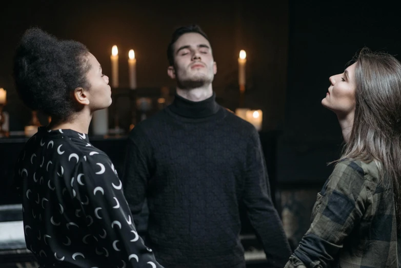 a group of people standing in front of a piano, doing witchcraft, profile image, candlelit, actor