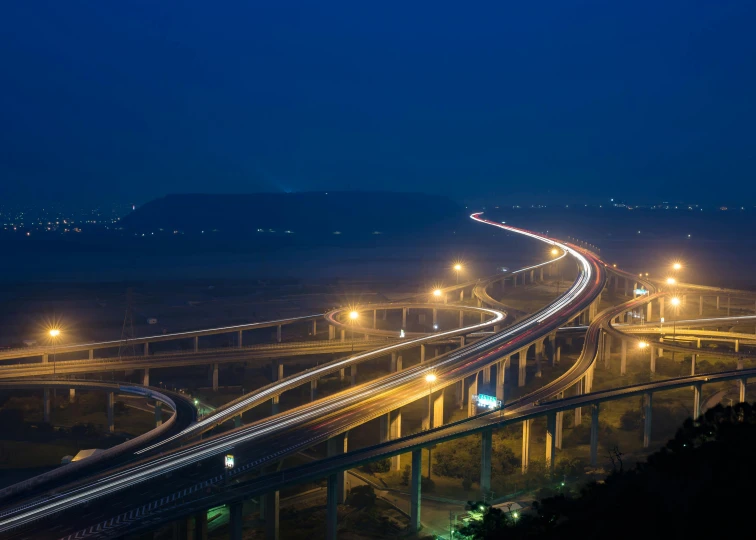 an aerial view of a highway at night, by Sudip Roy, pexels contest winner, 2 5 6 x 2 5 6 pixels, sky bridges, jin shan, panels