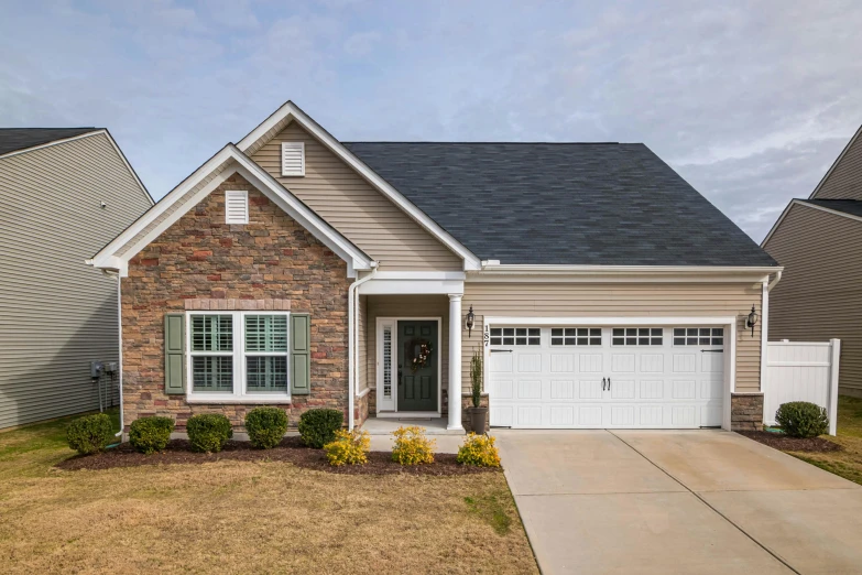 a house with a driveway in front of it, dan munford, listing image, full frame image, high resolution product photo