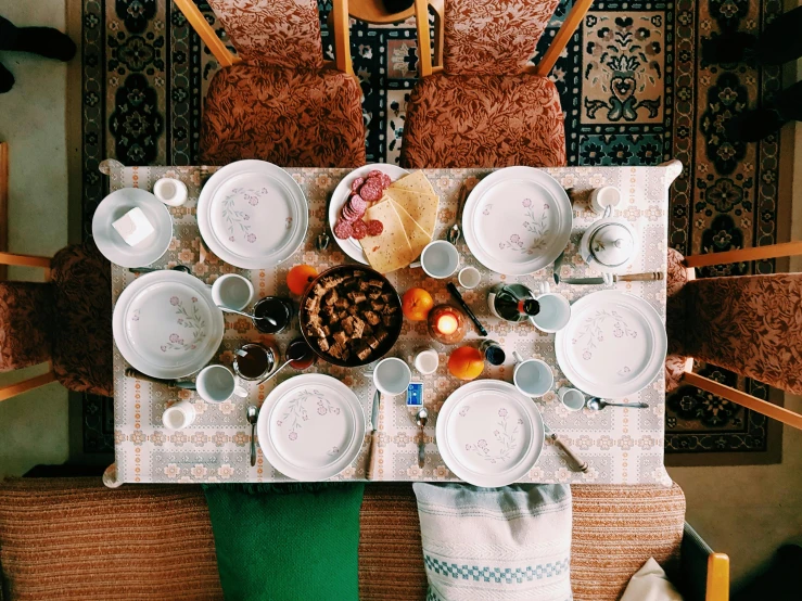 a table that has a bunch of plates on it, pexels contest winner, hurufiyya, breakfast, moroccan queens ny, gif, pov photo