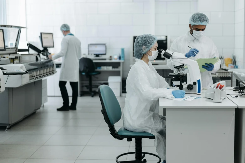 a group of people working in a lab, shutterstock, worksafe. instagram photo, taken in 2022, “wide shot, medical supplies